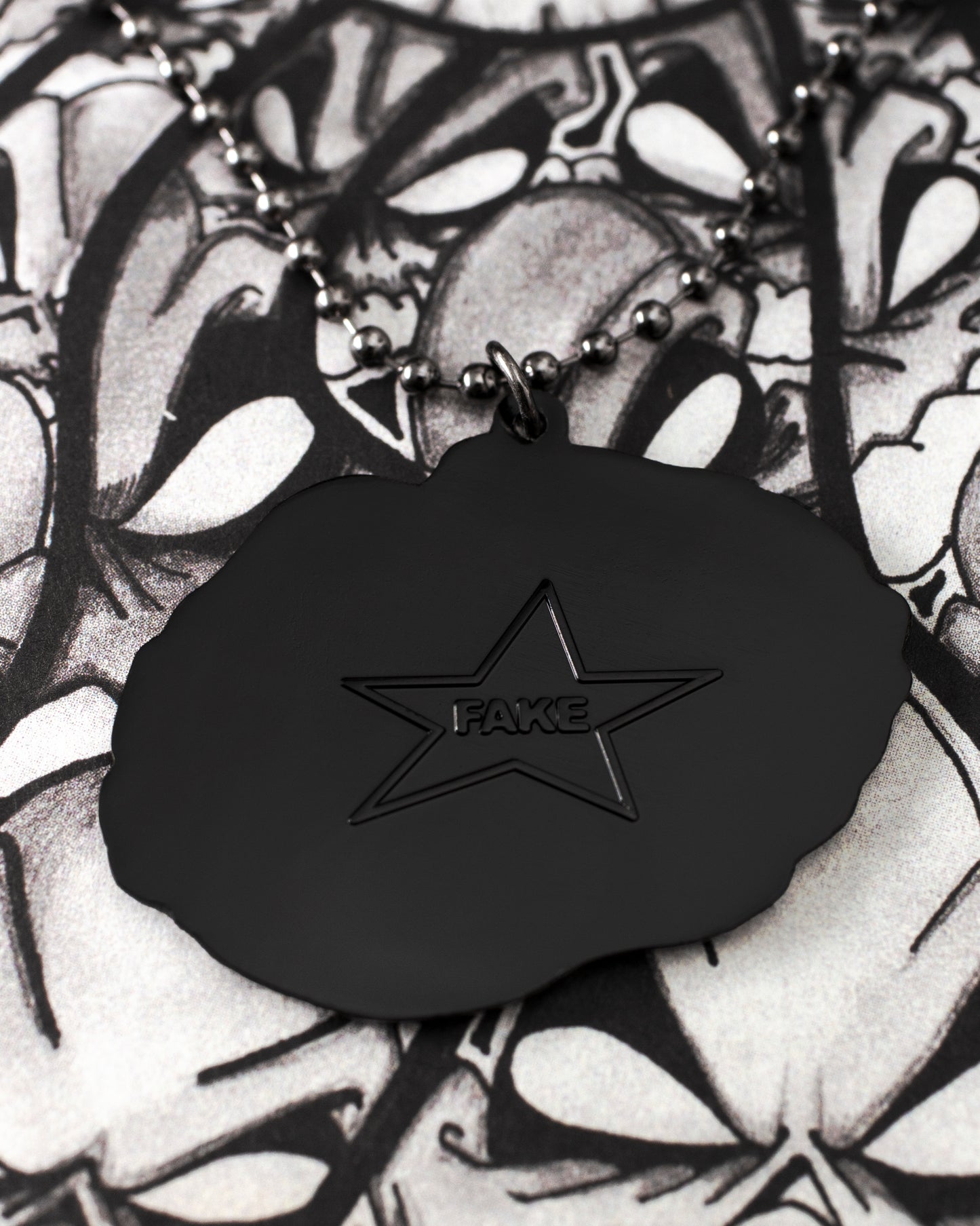 KISS OF DEATH NECKLACE